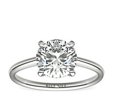 Petite Solitaire Engagement Ring in Platinum 